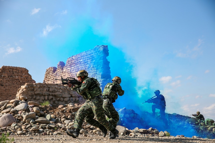 Soldiers of the Chinese People's Liberation Army take part in combat training.