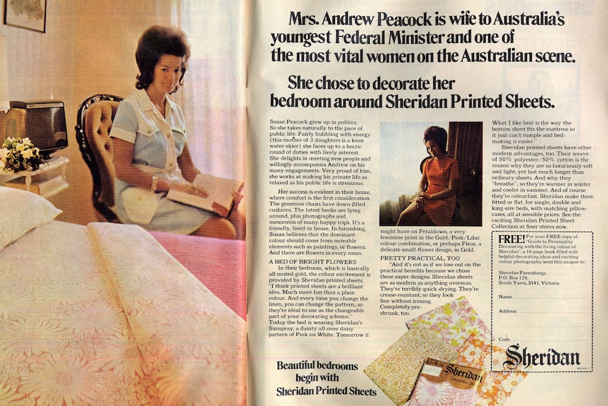 Susan Peacock sits beside a made bed as part of an advertisement for Sheridan sheets