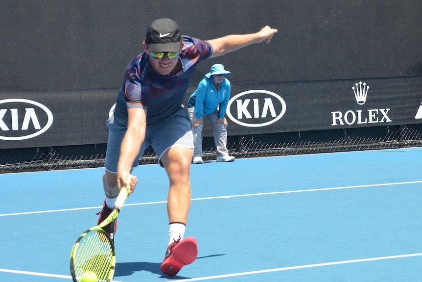 Archie Graham on the tennis court