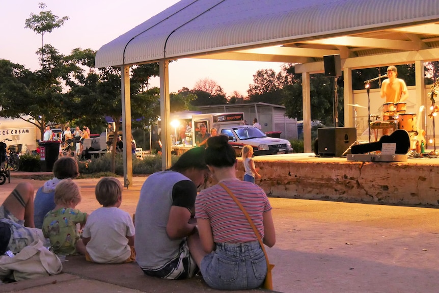 A crowd watched a band on stage at the Broome markets