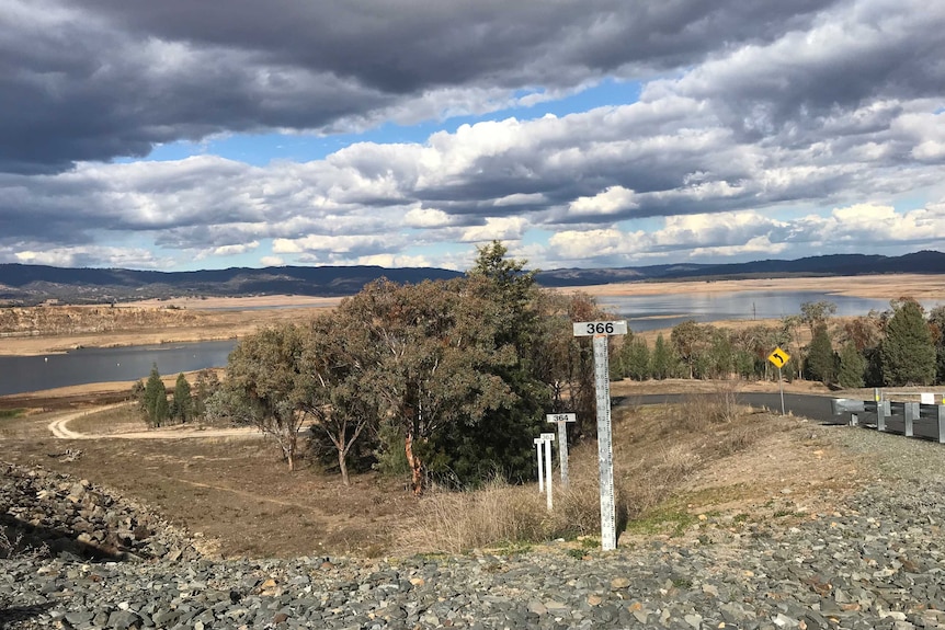 Looking towards a lower level of water in a big dam.