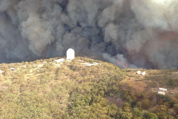 Aerial photo shows fire approaching Siding Spring Observatory