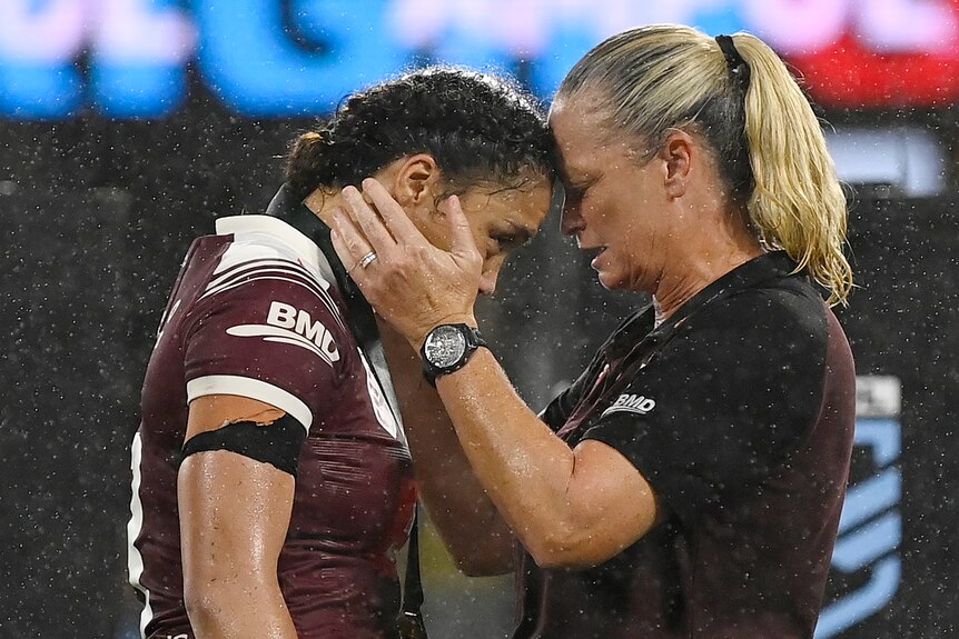 Shannon Mato of the Maroons is presented with the 'Player of the Series' medal after winning game three of the 2024 Women's State of Origin series between Queensland Maroons and New South Wales Sky Blues at Queensland Country Bank Stadium on June 27, 2024 in Townsville, Australia. 