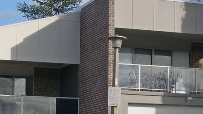 Photo showing medium density housing in Canberra, with two townhouses on one block.