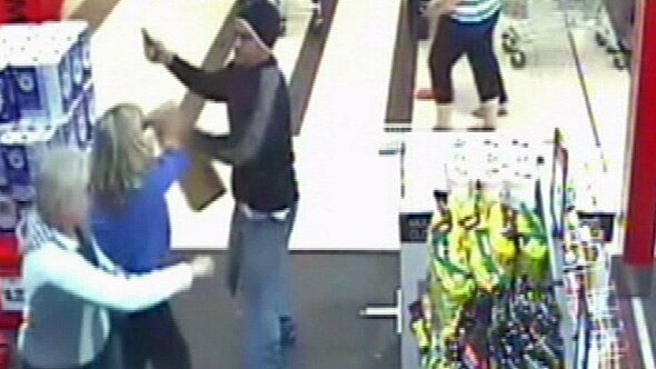 Christopher Wilkinson slashes at a shop assistant