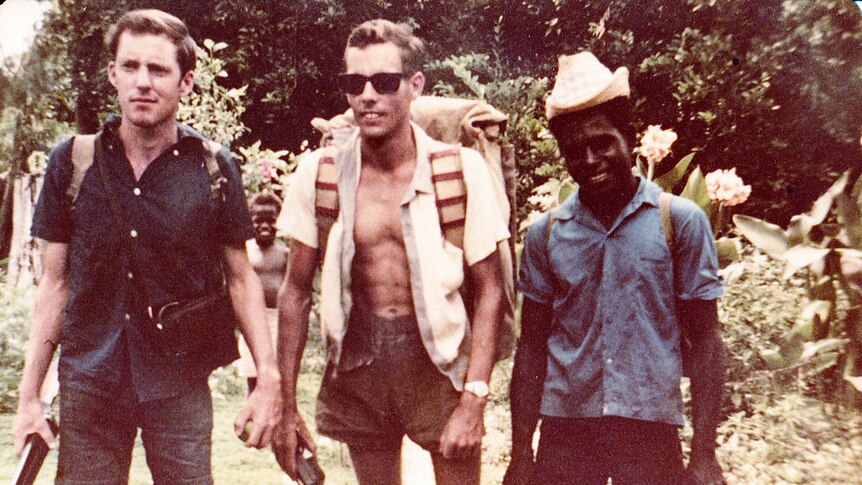 Col Meyers, at  left, a young man in Papua New Guinea