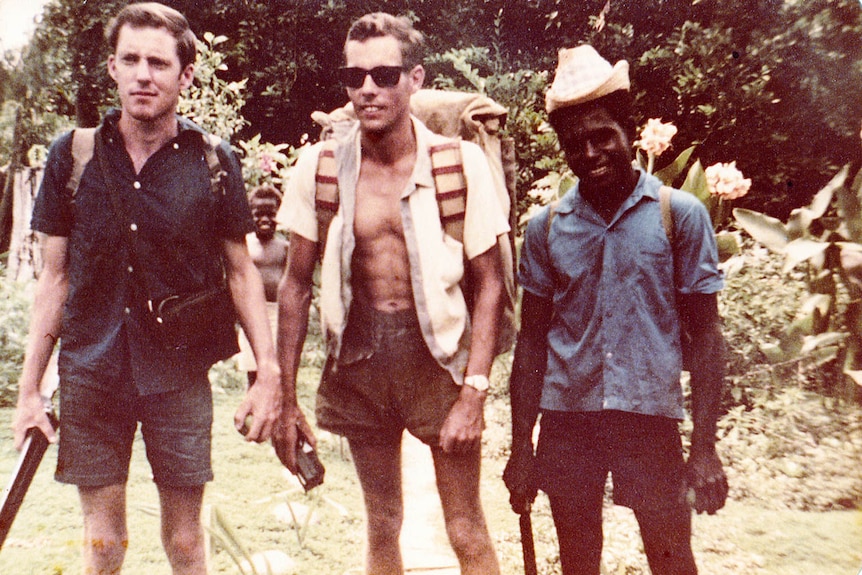 Col Meyers, at  left, a young man in Papua New Guinea