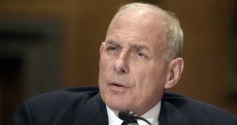 John Kelly speaks into the microphone at his confirmation hearing.