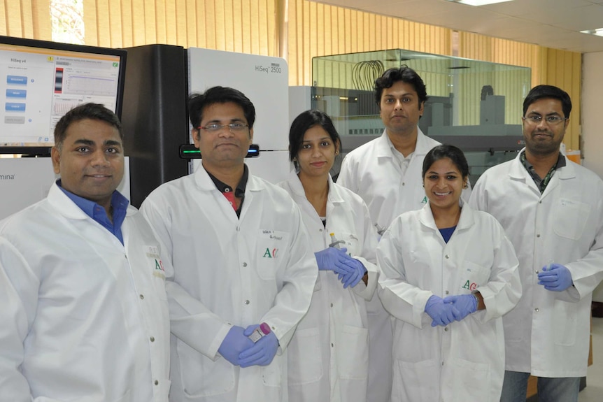 Dr Rajeev Varshney (left) Coordinator of the sequencing project with ICRISAT researchers, looking at coding peanut DNA