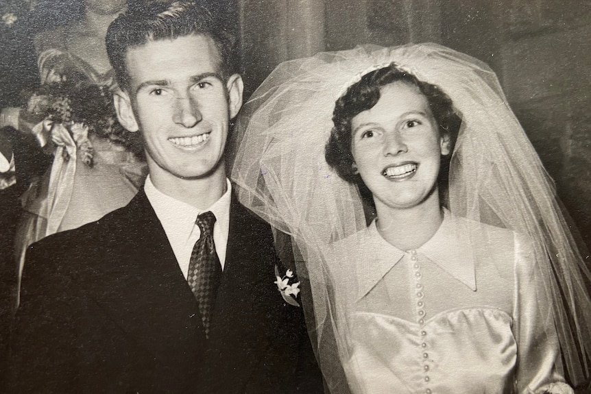 Black and white photo from 1951 of a couple getting married.