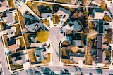 an aerial view of a suburban cul-de-sac