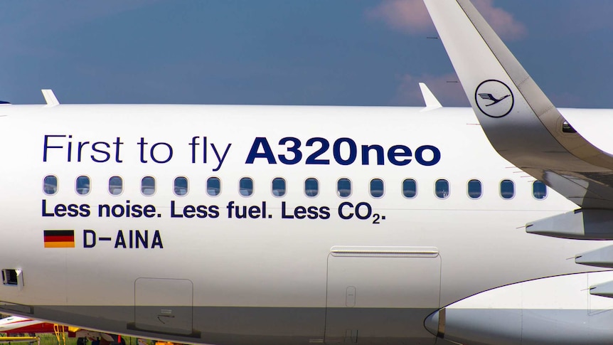 A close-up shows the rear quarter of an Airbus A320neo, with the words 'less noise. less fuel. less C02' printed on the side.