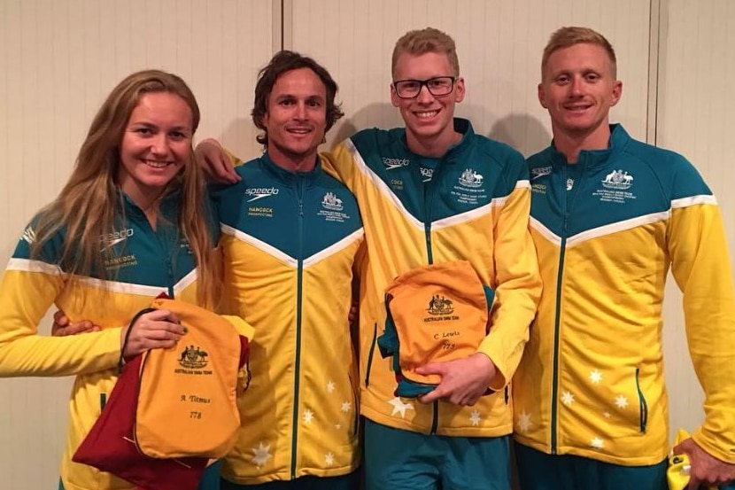 Tasmanian swimmer Ariarne Titmus with other members of the Dolphins Australian Swim team in 2016.