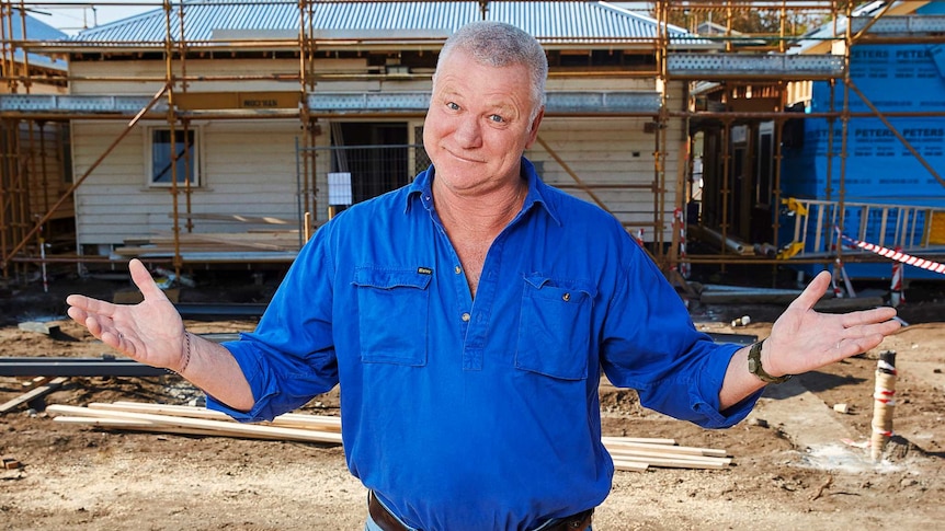 Scott Cam on a building site.