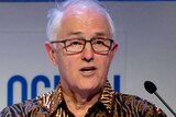 Australia's former prime minister Malcolm Turnbull wears a batik shirt while giving a speech during a conference in Bali.