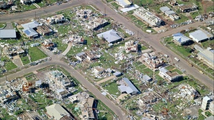 Destroyed buildings and scattered debris in the aftermath of Cyclone Tracey.