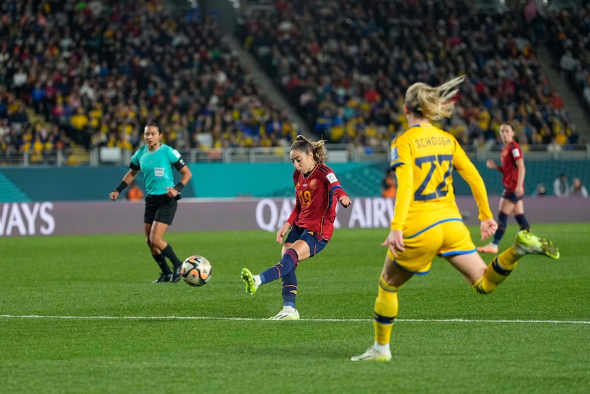 Olga Carmona kicks a ball that will win Spain the Women's World Cup semifinal against Sweden.
