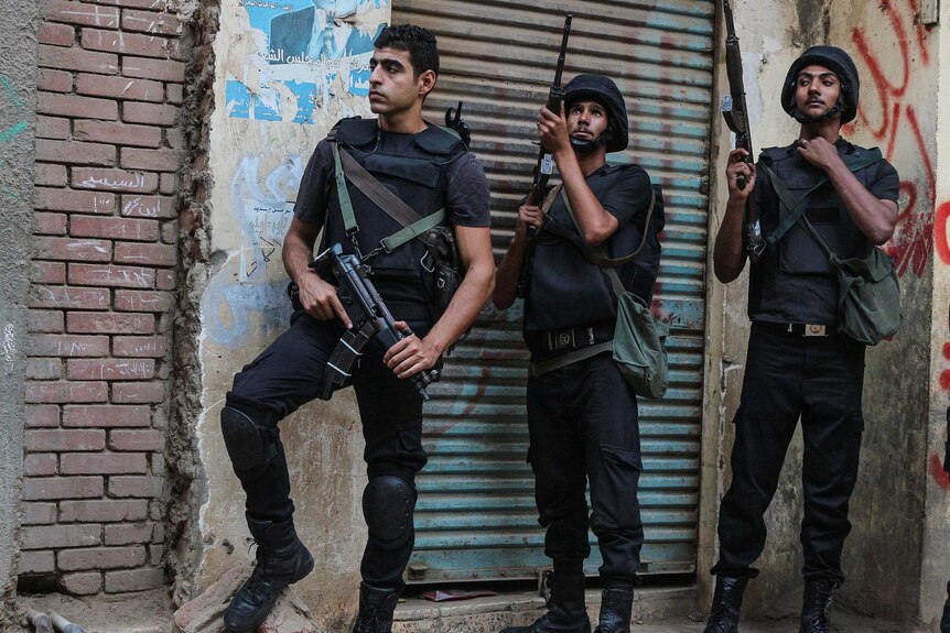 Egyptian security forces on patrol in Giza