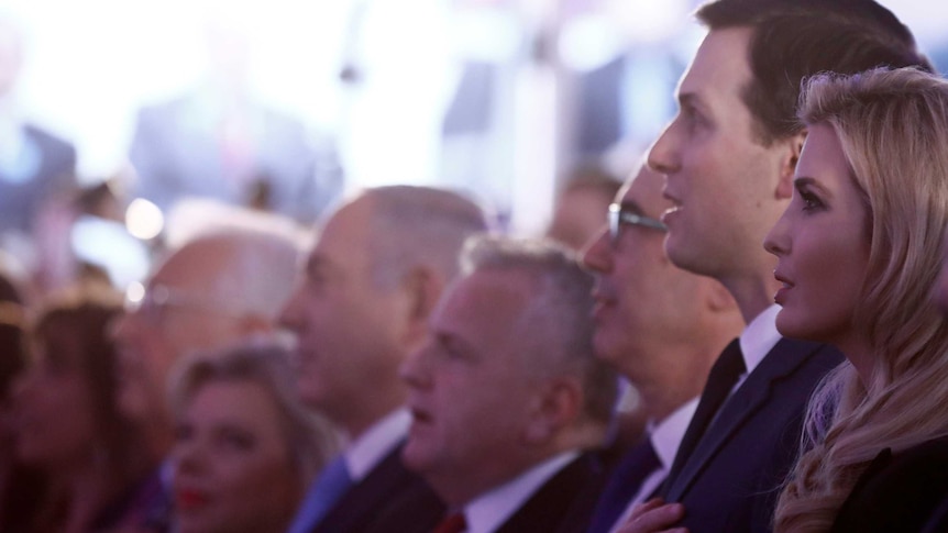 Jared Kushner and Ivanka Trump stand near Israeli PM Benjamin Netanyahu during the US national anthem.