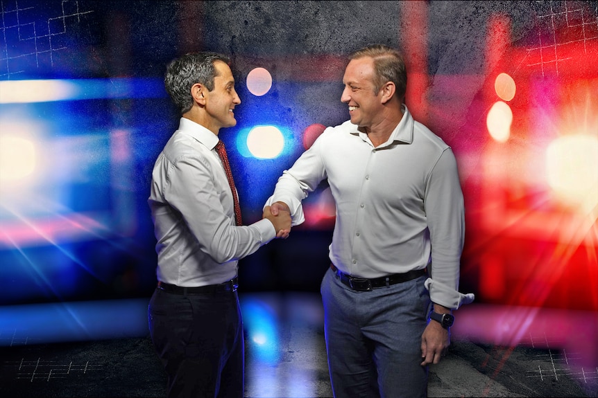 A graphic hows two men shaking hands with blue shining behind him and red shining behind the other man.