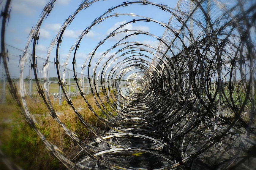 Razor wire fencing.