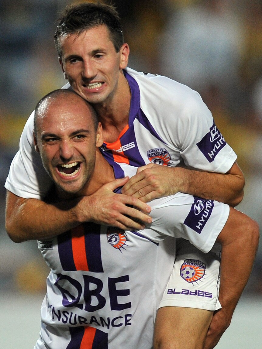 Mehmet and Miller celebrate