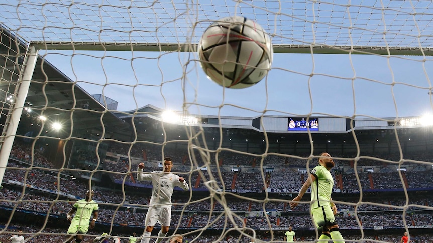 Manchester City's Fernando scores an own goal against Real Madrid in the Champions League semi-final.