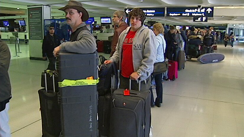 Unhappy passengers are delayed at Sydney Airport after a power outage on July 30, 2011.