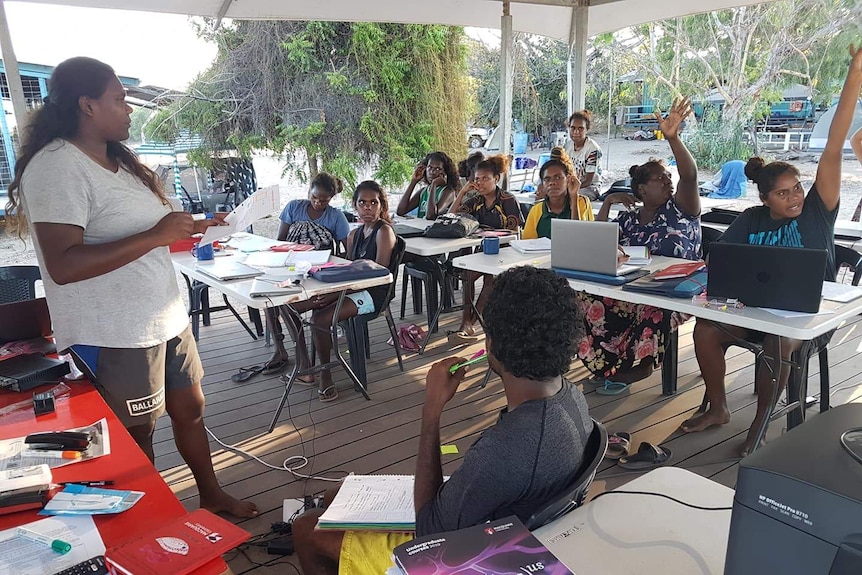 Students at work in the open-air classroom at Wuyagiba outstation