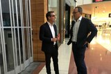 Steven Marshall and Corey Wingard speaking inside a closed shopping centre.