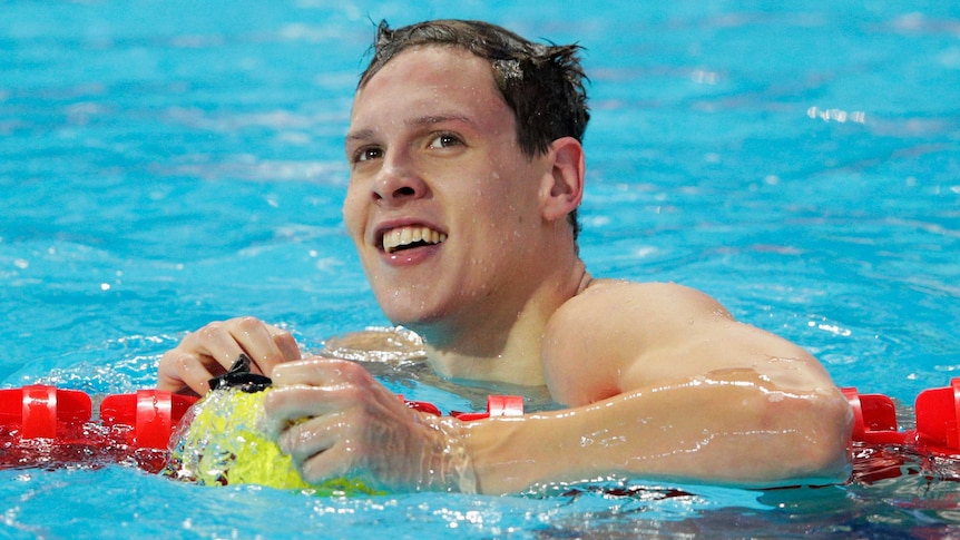 Australia's Mitch Larkin reacts after the 100m backstroke semi-final at the swimming world titles.
