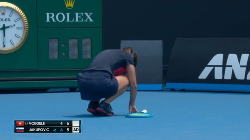 Dalila Jakupovic chokes in heavy smoke during an Australian open qualifier.