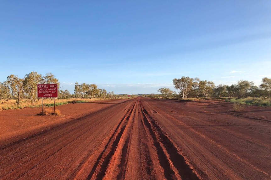 Image of a stretch of the Tanami Road near Halls Creek in Western Australia.