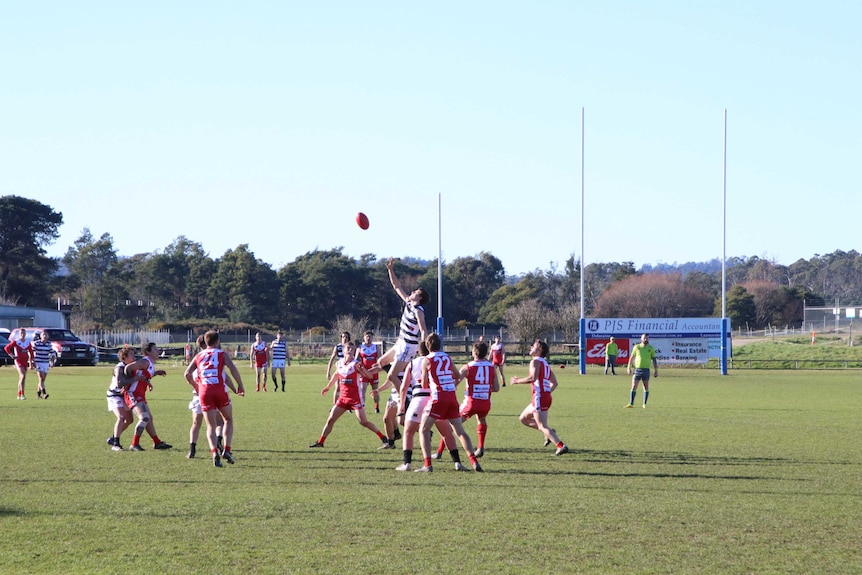 A Deloraine player reaches for the ball during Saturday's match against Bracknell.