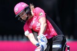 Ellyse Perry plays a drive for the Sixers
