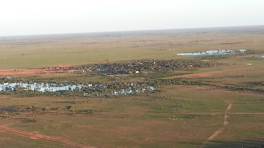 Kanandah station on the Nullarbor Plain is surrounded by green pasture and water after a great season