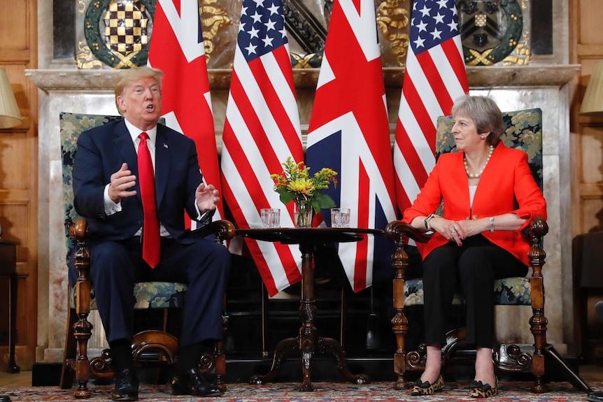 Trump meets with Theresa May in England
