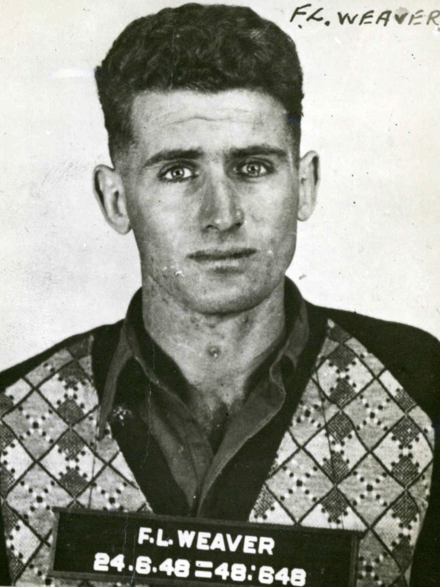 A black and white police mug shot of Frank Weaver.