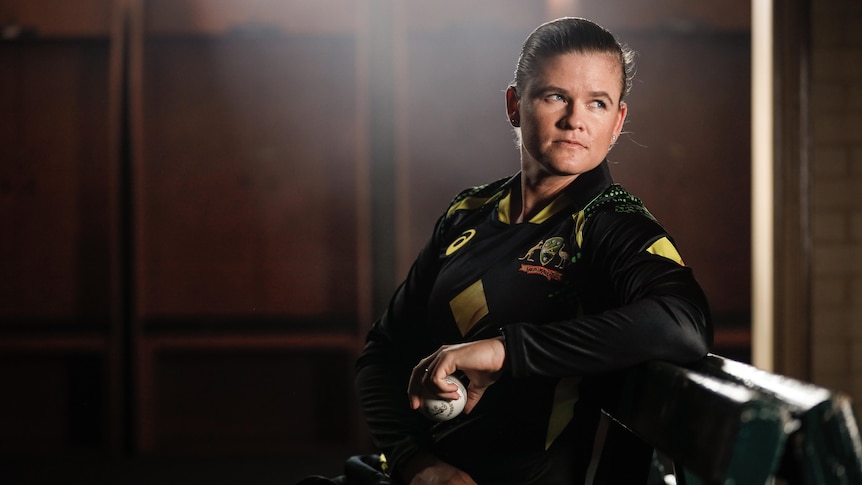 Jonassen appears pensive as she looks over her left shoulder as she sits on a bench in the old changerooms at the SCG