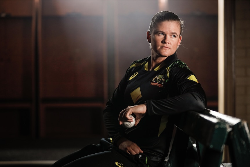 Jonassen appears pensive as she looks over her left shoulder as she sits on a bench in the old changerooms at the SCG