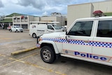 A police car parked in front of Cairns Central Shopping Centre.