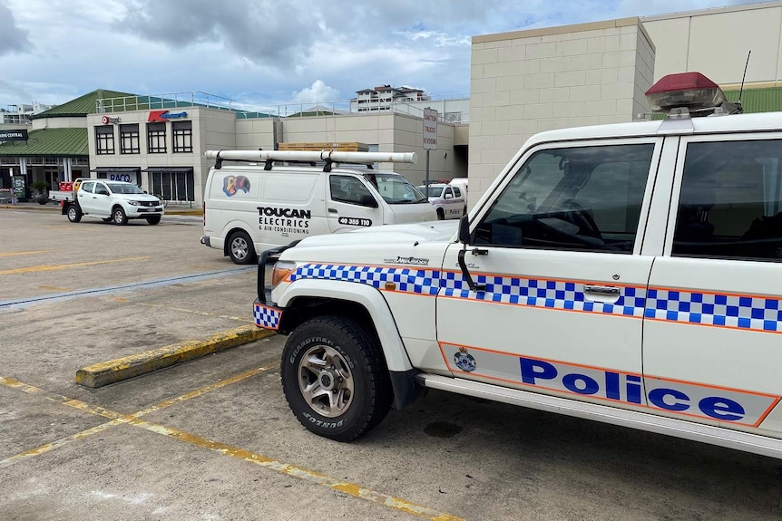 A police car parked in front of Cairns Central Shopping Centre.