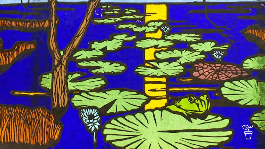 Leadlight glass with water,  lily pads, trees and a frog