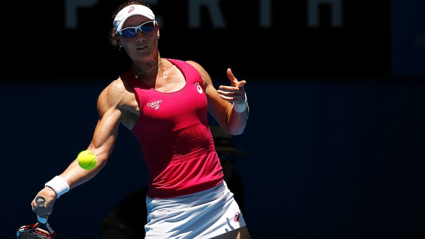 Australia's Samantha Stosur plays a forehand against Italy's Flavia Pennetta at the Hopman Cup.