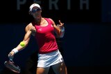 Australia's Samantha Stosur plays a forehand against Italy's Flavia Pennetta at the Hopman Cup.