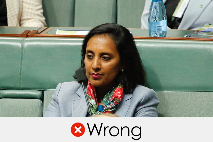 Michelle Ananda-Rajah sits silently in the house of representatives. VERDICT: Wrong with a red tick
