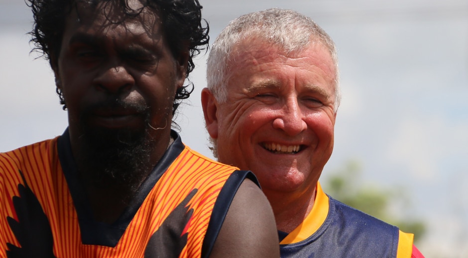NT Police Sergeant Scott Rose, with a fellow Crows player.