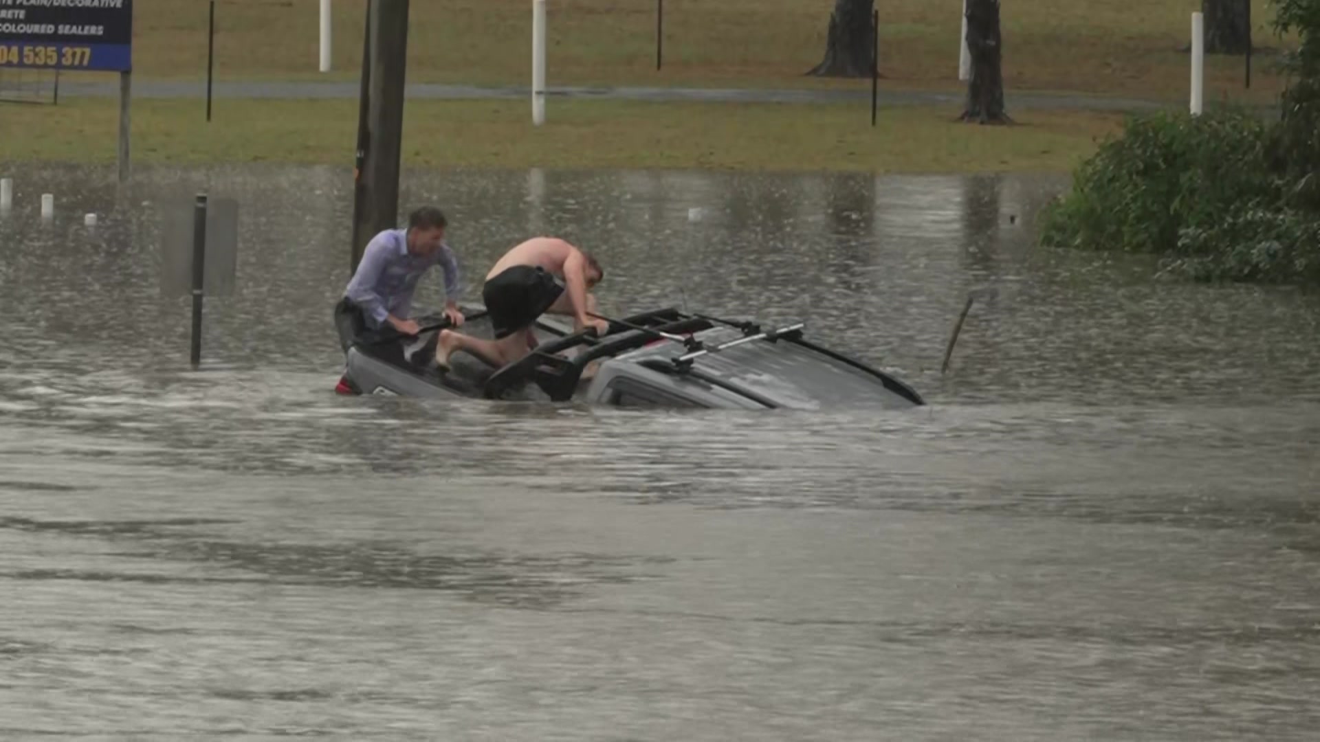 Breaking: ABC reporter saves man from floodwaters