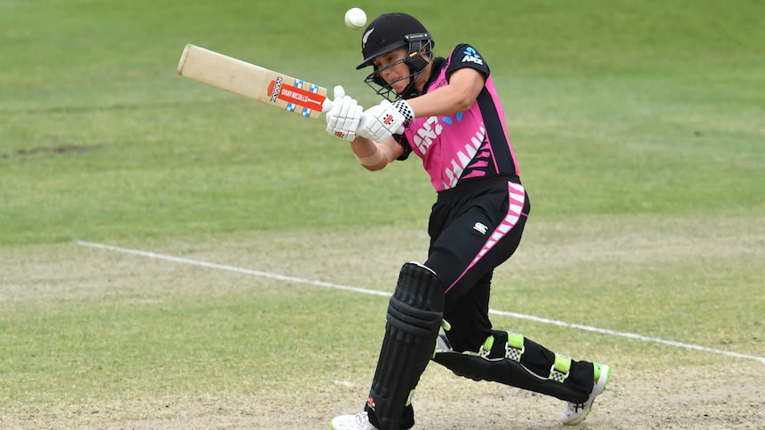 A New Zealand batter lofts the ball through square leg to the boundary to win a T20 international.