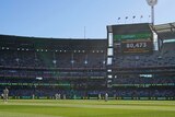 A look across the MCG as the scoreboard shows the day one crowd figure for the Boxing Day Test.